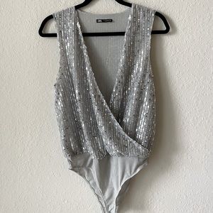 Shinny Zara bodysuit, silver in size Small.